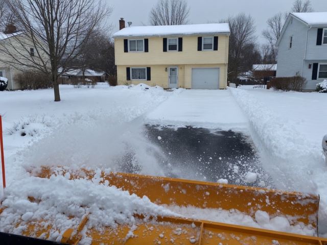 Clearing the driveway during the storm